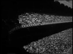 B/W 1956 crowded Yankee Stadium watching Don Larsen pitching a 'perfect' Game 5 of the World Series / NYC / newsreel Stock Footage