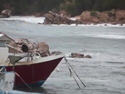 Storm waves breacking on the harbor wall Stock Footage