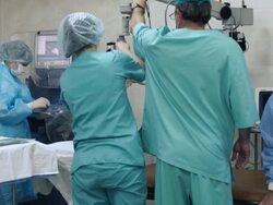 Surgical team prepare to do the operation Stock Footage