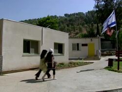 MS PAN Two womens walking away   / Gilboa, Israrel Stock Footage