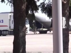 Kharkiv Airport MH17 Coffins unloaded from lorry News Clip