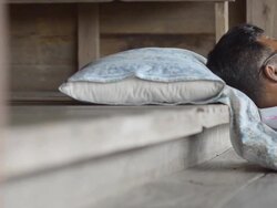 panning : old man use phone at home Stock Footage