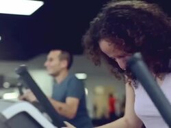 Girl on a cardio machine Stock Footage