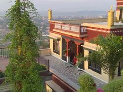 WS ZI Children in red robes walking around  Buddhist monastery AUDIO / Kathmandu, Central Region, Nepal  Stock Footage
