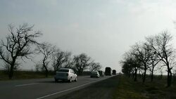 CLEAN : Flying Russian flag, armed men block obser News Clip