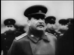 B/W 1944 close up Joseph Stalin in uniform looking up outdoors / documentary Stock Footage