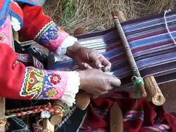 Traditional weaving of alpaca in Peru Stock Footage