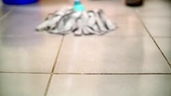 Cleaning the floor with a mop. Stock Footage