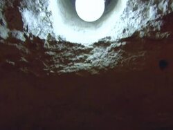 MS TD Three Ladies praying in cave that is under Foundation Stone in Temple Mount AUDIO / Jerusalem, Israel Stock Footage