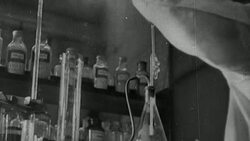 MONTAGE Factory producing goods, bankers getting rich, and scientist researching while crippled survivors of World War I go begging / United Kingdom Stock Footage