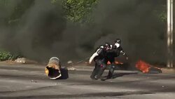 CLEAN : Venezuela divided as masked protesters and National Guard clash News Clip