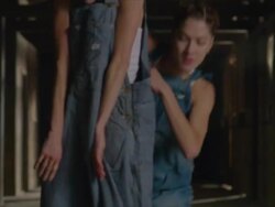 camera pan up of two dancers dancing in wooden barn Stock Footage