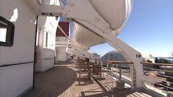 Tourists walk around decks of the Queen Mary News Clip