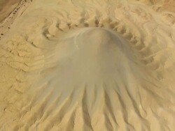 Aerial conic hill in the Negev Desert, situated near wadi meishar, Southern Negev. Near machtesh gadol and oron factory. It appears in this special form only from air. Geological structure is chalk, a form of limestone composed of the mineral calcite. Isr Stock Footage