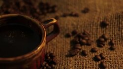 HD dolly camera shot: Coffee black art at coffee shop. Stock Footage