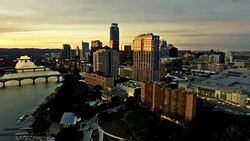 Dramatic High Contrast Sunset Aerial Drone View Austin Texas Skyline Cityscape Fly Over Downtown Capital City Stock Footage