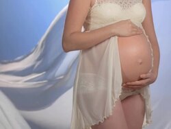 HD Super Slow-Mo: Pregnant Woman Wearing Lingerie Stock Footage