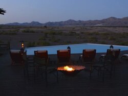 MS Shot of Okahirongo Elephant Lodge exclusive expensive safari fireplace at resort / Namib Desert, Namibia, South Africa Stock Footage