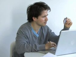 Man shopping online, UK Stock Footage