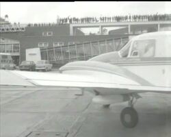 SHEILA SCOTT ARRIVES HOME News Clip