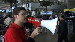 Foreigners at airport await flight out of tense capital News Clip