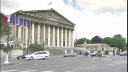 Traffic passes a government building in Paris. Stock Footage