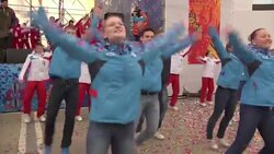Olympic flame arrives in Sochi city centre, fan arrivals at first figure skating competition News Clip