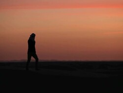 Man In the desert of Sahara Stock Footage