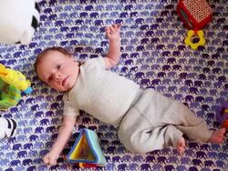 MS Shot of baby lying awake in his crib / Lamy, New Mexico, United States Stock Footage