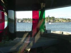 Lighthouse and small boats Stock Footage