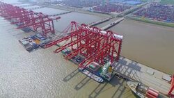 Aerial view of commercial dock with cargo containers in shanghai. Stock Footage