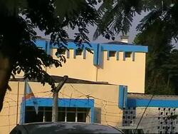 Exterior of nuclear agency in Kinshasa, comment News Clip