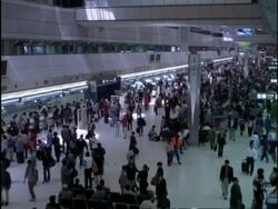 Golden week holiday crowds, departure lounge, Tokyo International Airport, Haneda, Japan Stock Footage