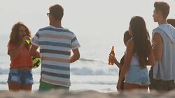 Party on the beach at sunset Stock Footage