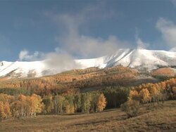 MS T/L Majestic Rocky Mountains Peaks, Brillant Yellow Aspen Trees / Telluride, Colorado, United States Stock Footage