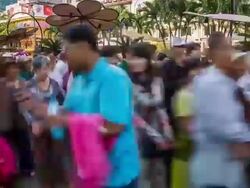 MS T/L PAN View of People enjoying flower decorations during Tet (lunar new year) / Ho Chi Minh City, Southeastern, Vietnam Stock Footage
