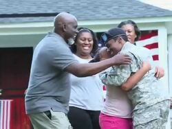 MS Family Greeting Female Soldier Returning Home from Military Service / Eastville, Virginia, United States Stock Footage