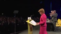 Nicola Sturgeon receives a standing ovation as she prepares to address the SNP conference News Clip