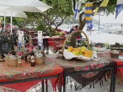 MS Local products and wine bottles standing on table at restaurant / Baska, Island of Krk, Croatia Stock Footage