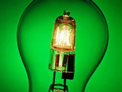 Timelapse close up of a halogen energy saving light bulb rotate and focus change Stock Footage