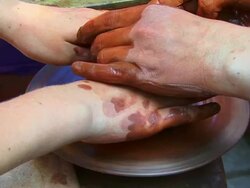 Hands making pottery on a Wheel Stock Footage