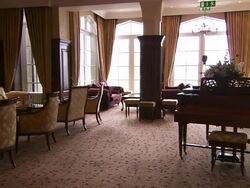 Traditional hotel lounge, old fashioned chairs and piano, Lough Erne, Northern Ireland Stock Footage