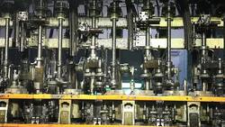 Glass factory. Close up of a Bottle production machine. Stock Footage