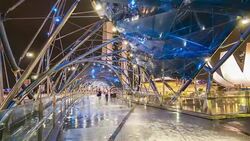 The Helix Bridge at night Stock Footage
