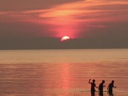 Three boys at sunset Stock Footage