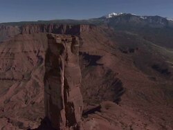 High Angle aerial - Buttes rise above the valley floor in Monument Valley / Arizona, USA Stock Footage