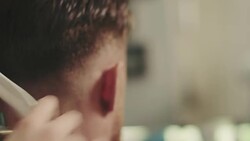Barber cutting a mans hair Stock Footage