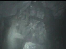 Drilling equipment pounded its way into one of the caverns where 33 miners have been trapped for a month and a half, completing a bore hole ahead of schedule Friday and raising hopes that the men can be pulled out earlier than expected. News Clip