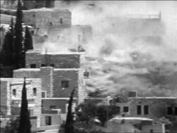 B/W 1967 smoke + flames rising from buildings after bombing in Six Day War / Jerusalem / newsreel Stock Footage