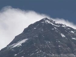 MS View of Mount Everest Summit with Clouds chasing over peak / Gorak Shep, Khumbu Region, Nepal Stock Footage